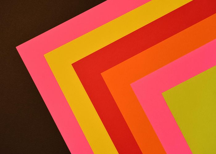 Symmetric abstract geometric patterns in neon colors